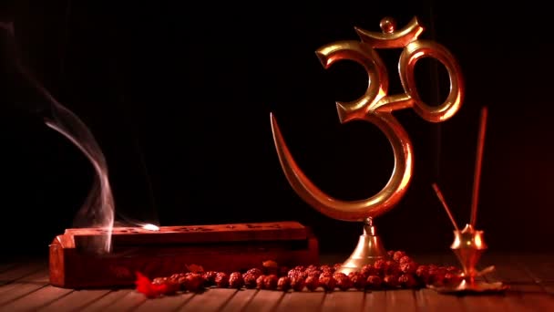 Om symbol and incense stick — Stock Video