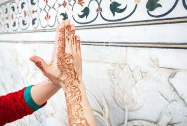 Woman hands in namaste in India clipart