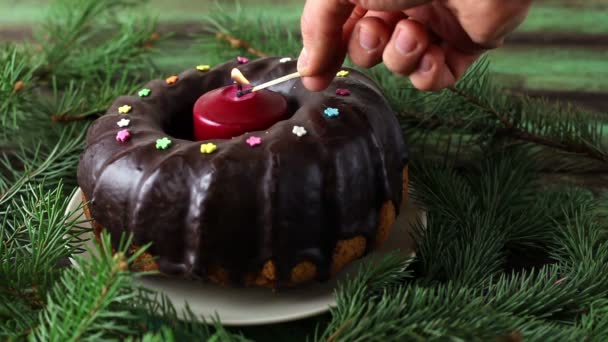 Christmas cake with candle — Stock Video