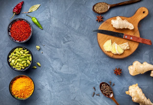 Selection of Spices at blue stone background — Stock Photo, Image