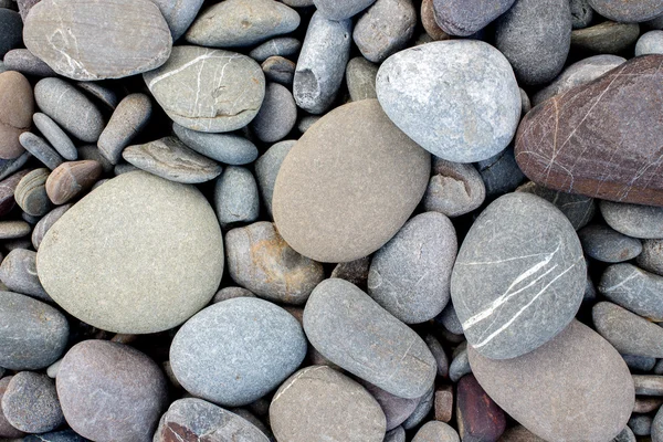 Fondo de piedras de playa — Foto de Stock