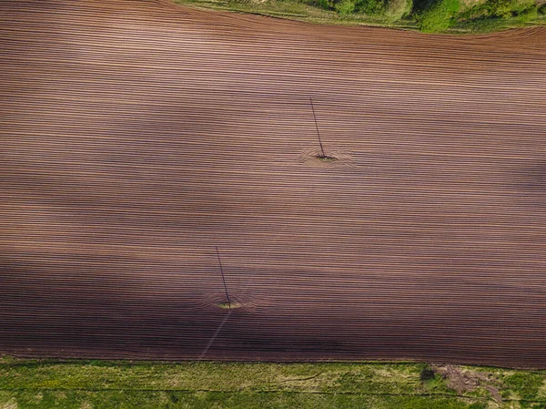 Vista del dron en un campo arado. Vista superior —  Fotos de Stock