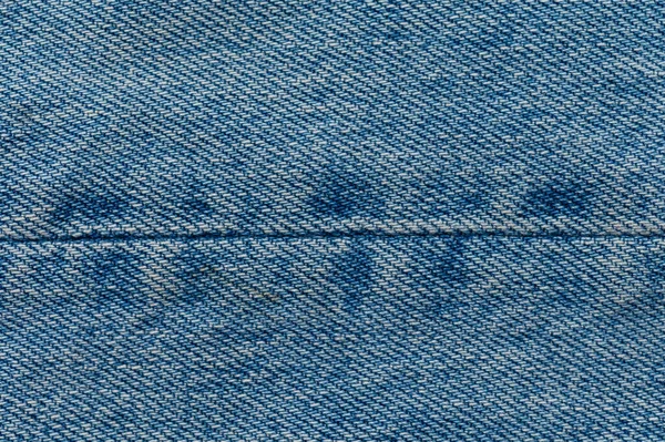 Jeans fechar o fundo. Costura de ganga — Fotografia de Stock