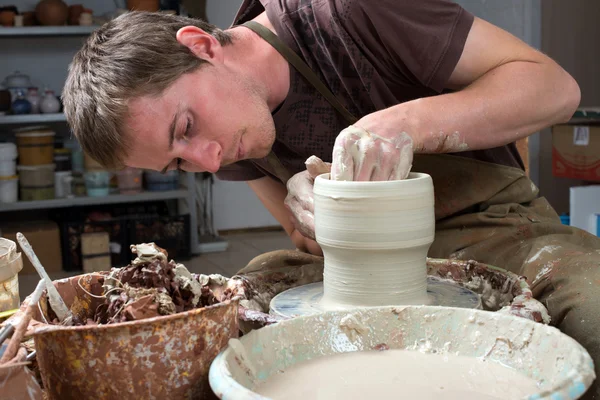 Hands of a potter, creating an earthen jar — Stock Photo, Image