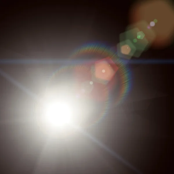 Zon en stralen van de zon op een zwarte achtergrond — Stockfoto