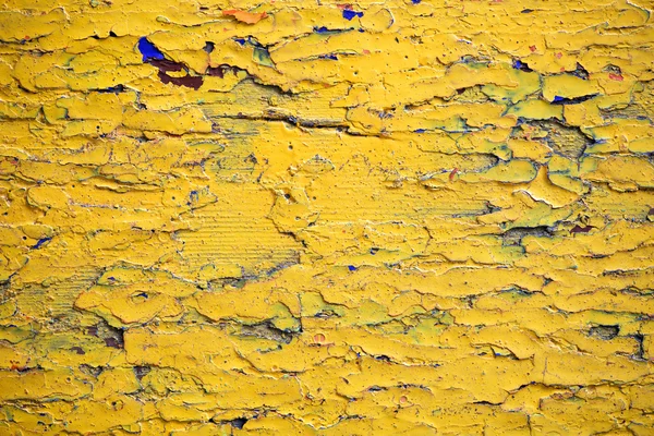 Old wooden surface covered with several layers of paint — Stock Photo, Image