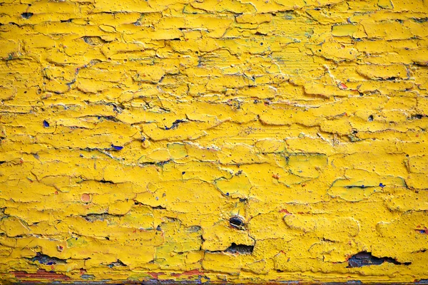 Old wooden surface covered with several layers of paint — Stock Photo, Image