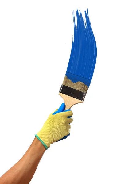 Pintura azul salpicando para fora da escova. Isolado sobre fundo branco — Fotografia de Stock