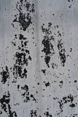 Derisi soyulmuş metalin sıkıntılı örtülü dokusu. Grunge arkaplanı.