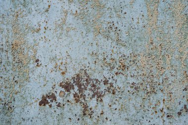 Derisi soyulmuş metalin sıkıntılı örtülü dokusu. Grunge arkaplanı.