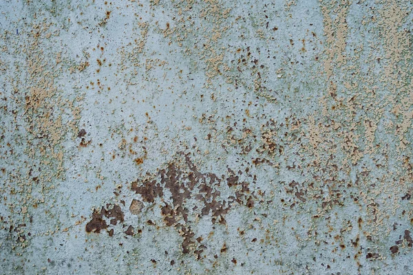 Zmatená překrývající se textura oloupaného kovu. Grunge pozadí. — Stock fotografie