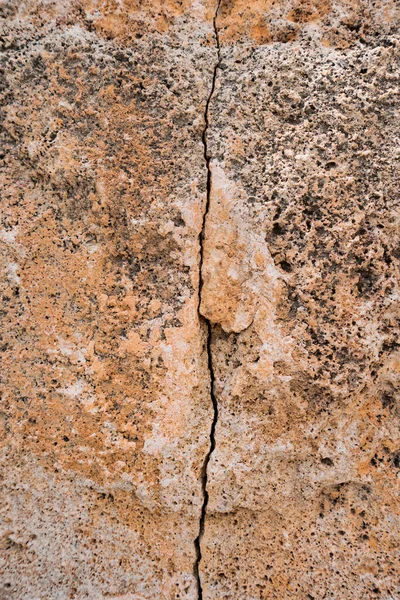 พื้นหลังหินที่มีรอยแตก — ภาพถ่ายสต็อก