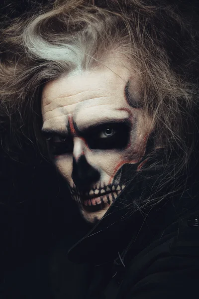 Portrait of man with Halloween skull makeup — Stock Photo, Image