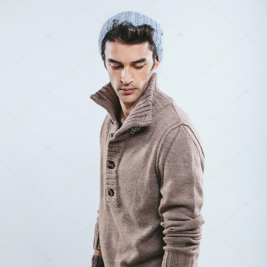 Fashionable man in winter knitted clothes