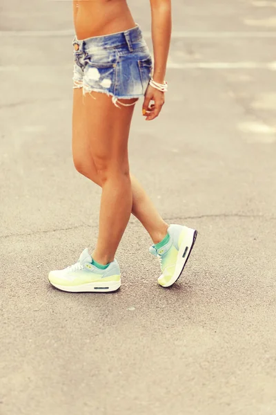 Sexy tanned woman legs close up — Stock Photo, Image