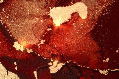 Kırmızı, kestane rengi ve altın soyut mermer kaplama.