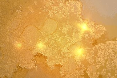 Çağdaş limon sarısı ve altın arkaplan boya sıçraması ve altın parıltısıyla