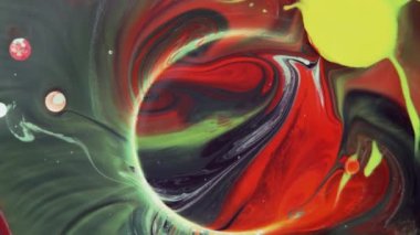 Renkli kabarcıklar. Siyah arka planda soyut kırmızı, sarı, yeşil karışımı. Sanatsal renk arkaplanı.