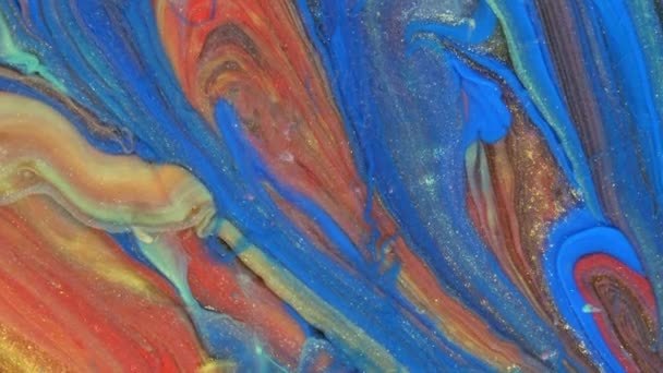 Abstract bright red and light pastel streams flow across the plane on a blue background. Marble texture. Fluid art. Liquid abstractions. — Stock Video