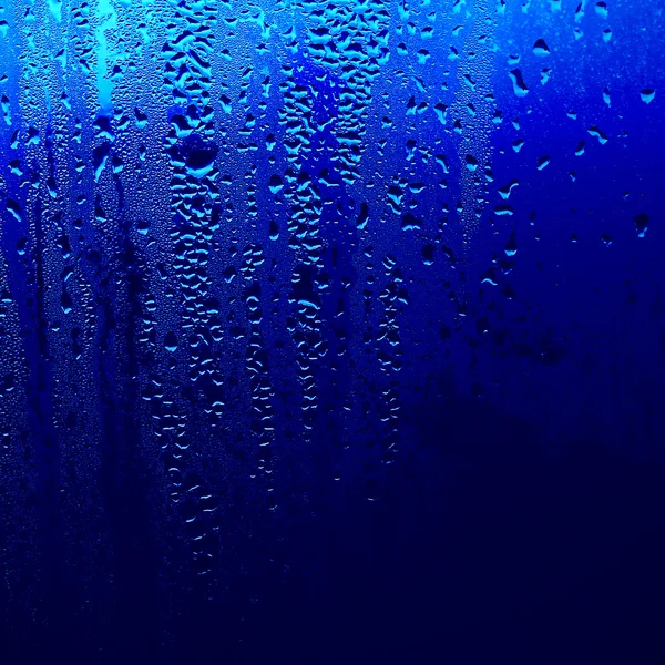 Beneveld venster, textuur drops, natte venster — Stockfoto