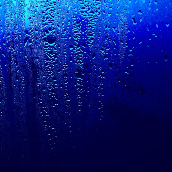 Misted window, texture drops, wet window — стоковое фото