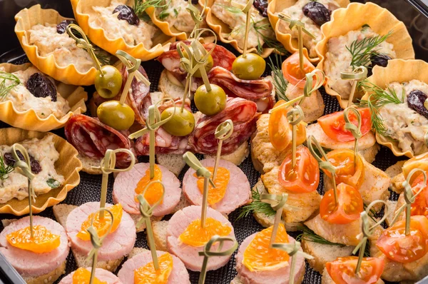 Closeup set different canapes and snacks — Stock Photo, Image