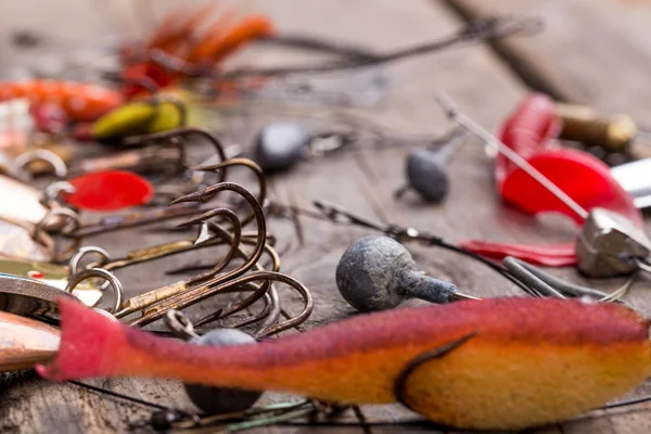 Fishing tackles and spoon on wooden — Stock Photo, Image