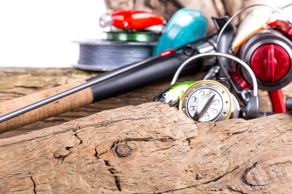 Fishing tackles and fishing baits on wooden — Stock Photo, Image