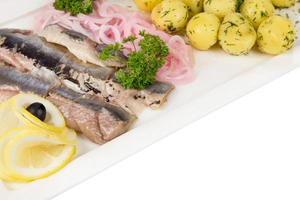 Marinated herring with onion and balls of potato — Stock Photo, Image