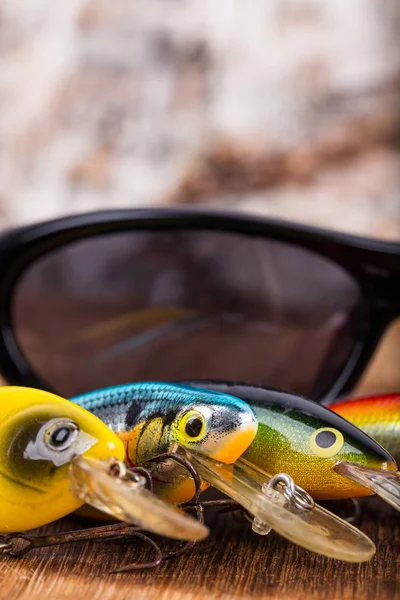 Closeup visserij lokaas wobblers met zonnebril — Stockfoto
