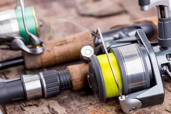 Fishing rod and reel with line — Stock Photo, Image