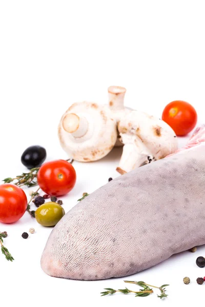 Uncooked raw tongue with serving spices — Stock Photo, Image