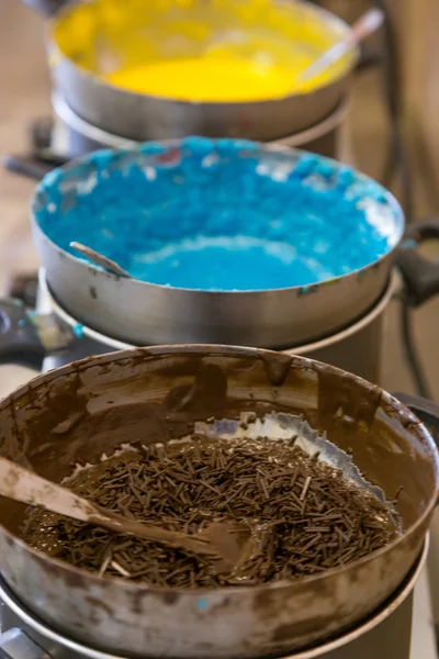 Glazed assorted colors in bowl on range — Stock Photo, Image