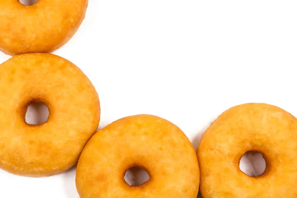 Gebratene runde Krapfen im Rahmen — Stockfoto