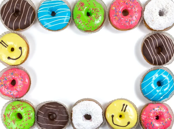 Donuts envidraçados sortidos em cores diferentes — Fotografia de Stock