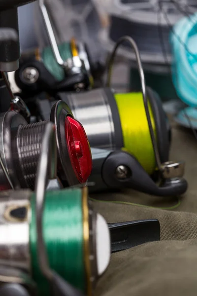 Fishing reels with line different colors — Stock Photo, Image
