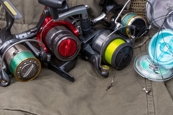 Fishing reels with line different colors — Stock Photo, Image