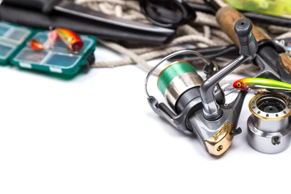 Fishing tackles and anchor with cord on white — Stockfoto