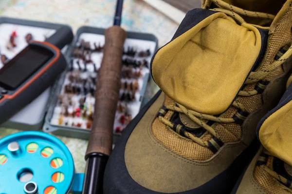 Waterproof shoes with fishing tackles — Stock Photo, Image