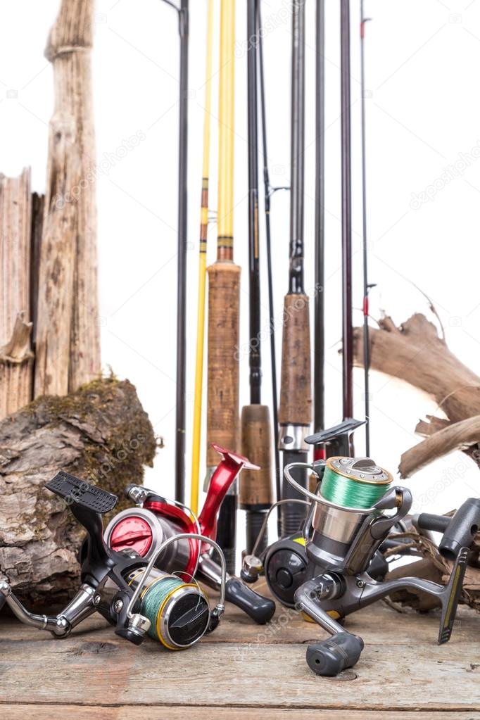 fishing reels and rods with boards and snag