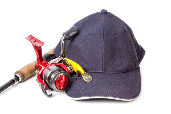 Fishing tackles with navy cap on white — Stock Photo, Image