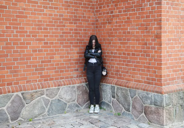 Young Beautiful Brunette Girl Black Jacket Jeans Stands Wall Gothic — Stock Photo, Image