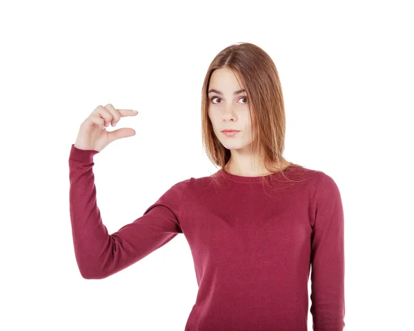 Young beautiful girl showing a little gesture — Stock Photo, Image