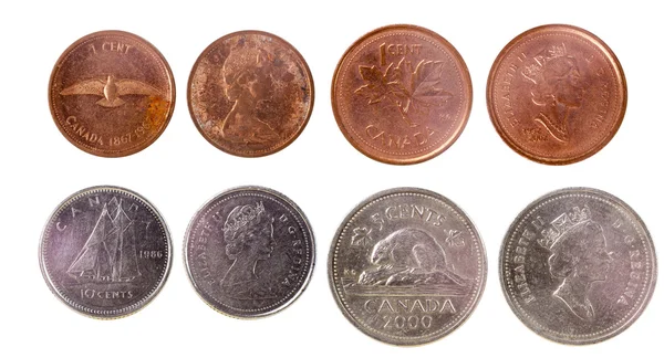 Quatro velhas moedas canadianas — Fotografia de Stock