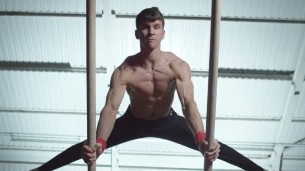 Gymnast training on parallel bars — Stock Video