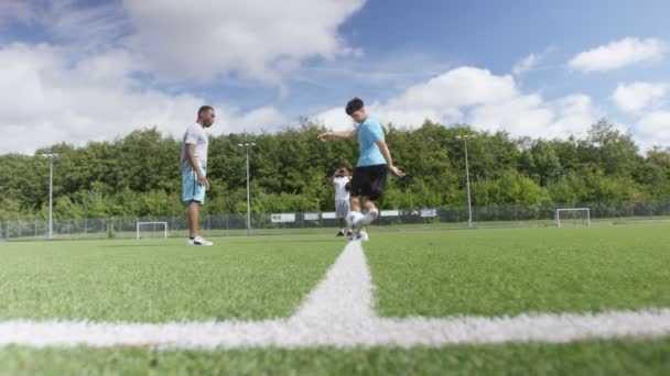 Soccer players showing off ball skills — Stock Video