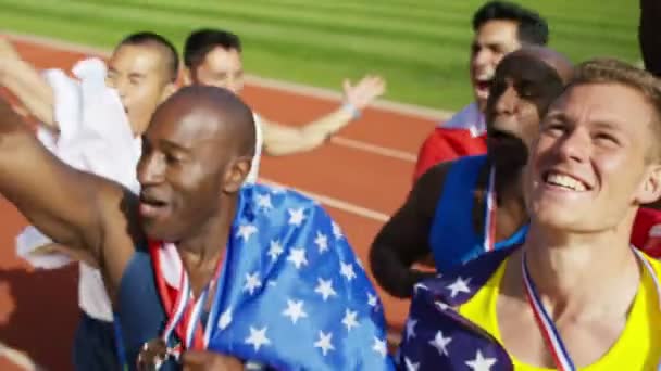 Athletes celebrate victory — Stock Video