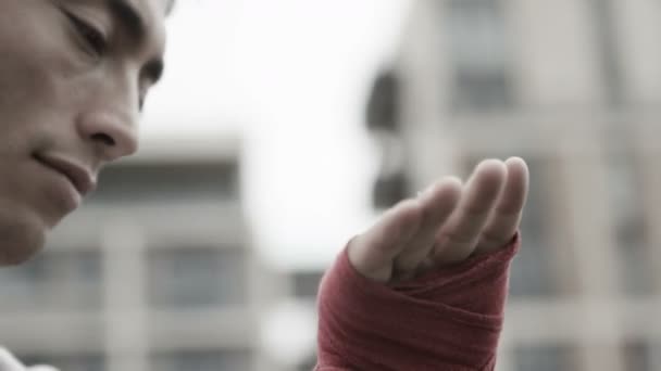 Fighter  taping his hands  for training — Stock Video