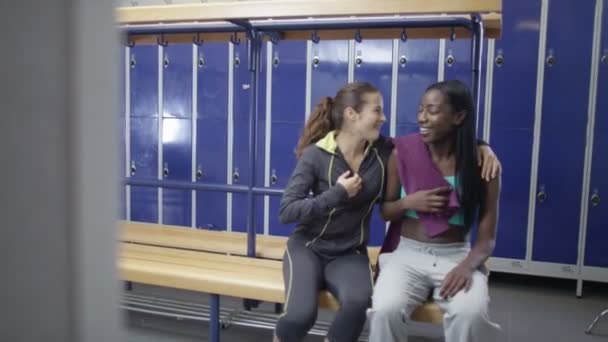 Women and high five in ladies' locker room — Stock Video