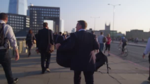 Workers and tourists walking through London — Stock Video